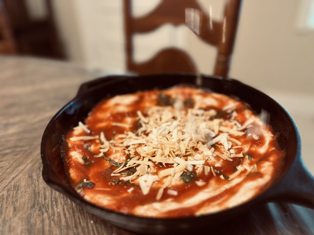 process of making homemade pizza in cast iron 10" pan